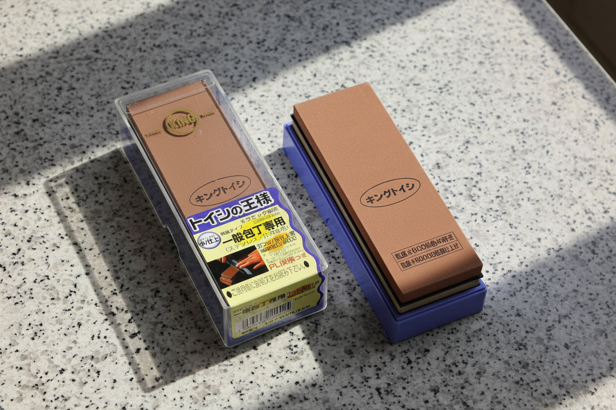 King Toiletry brown leather product with packaging on a white background