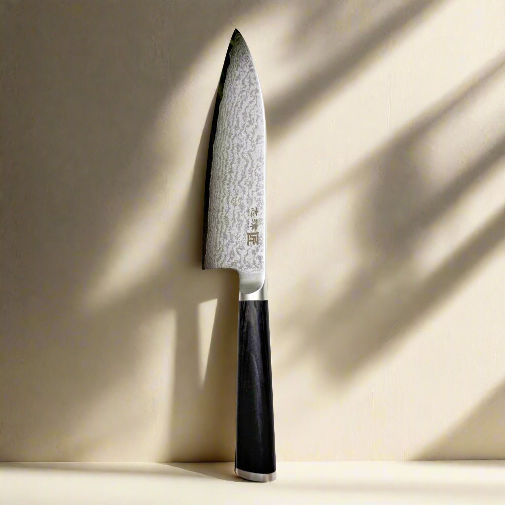 The Japanese Deba Knife: A Must-Have for Fish and Meat Preparation shown against a minimalist background.
