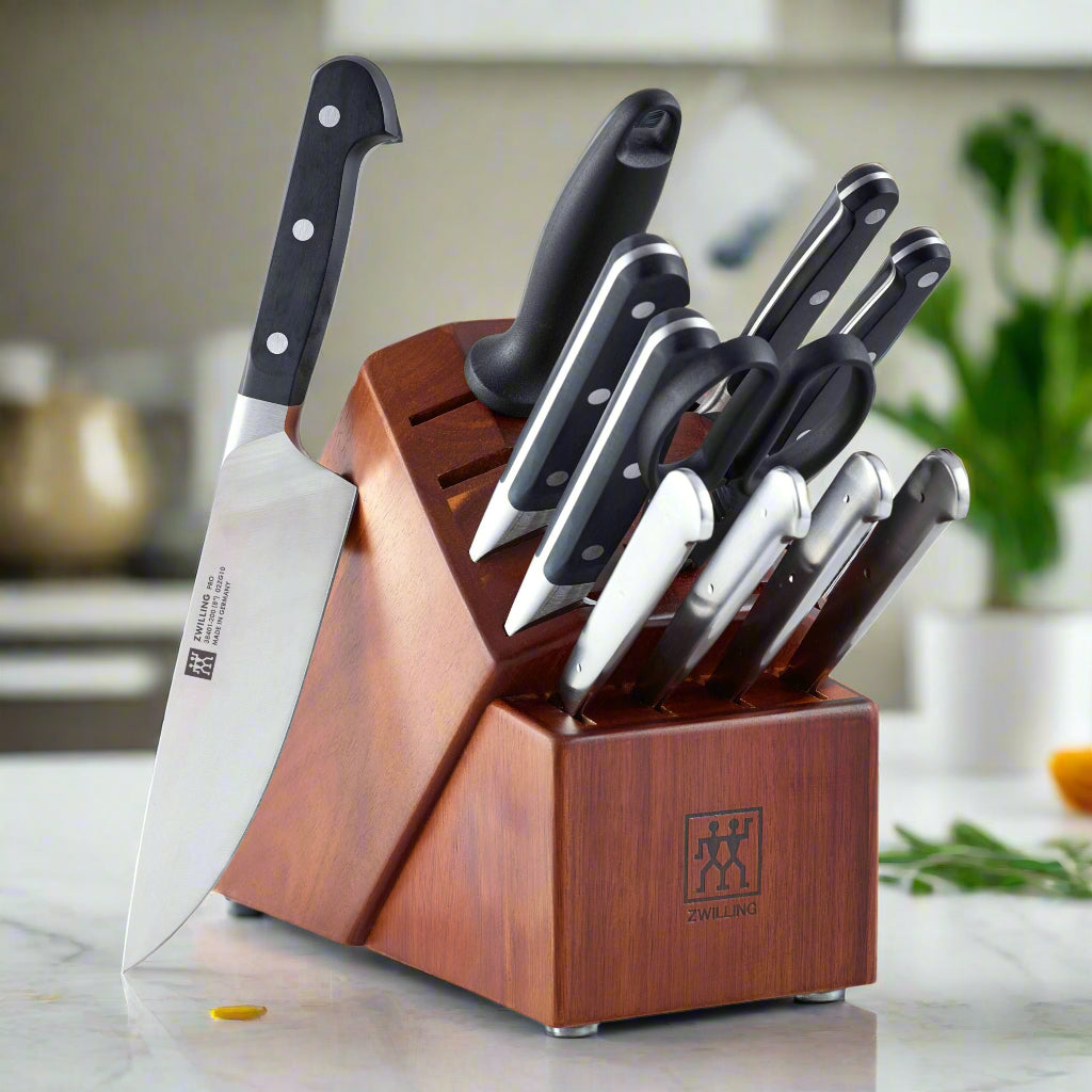 ZWILLING Pro 12 Piece Knife Block Set on kitchen counter showcasing ergonomic design and durable blades.