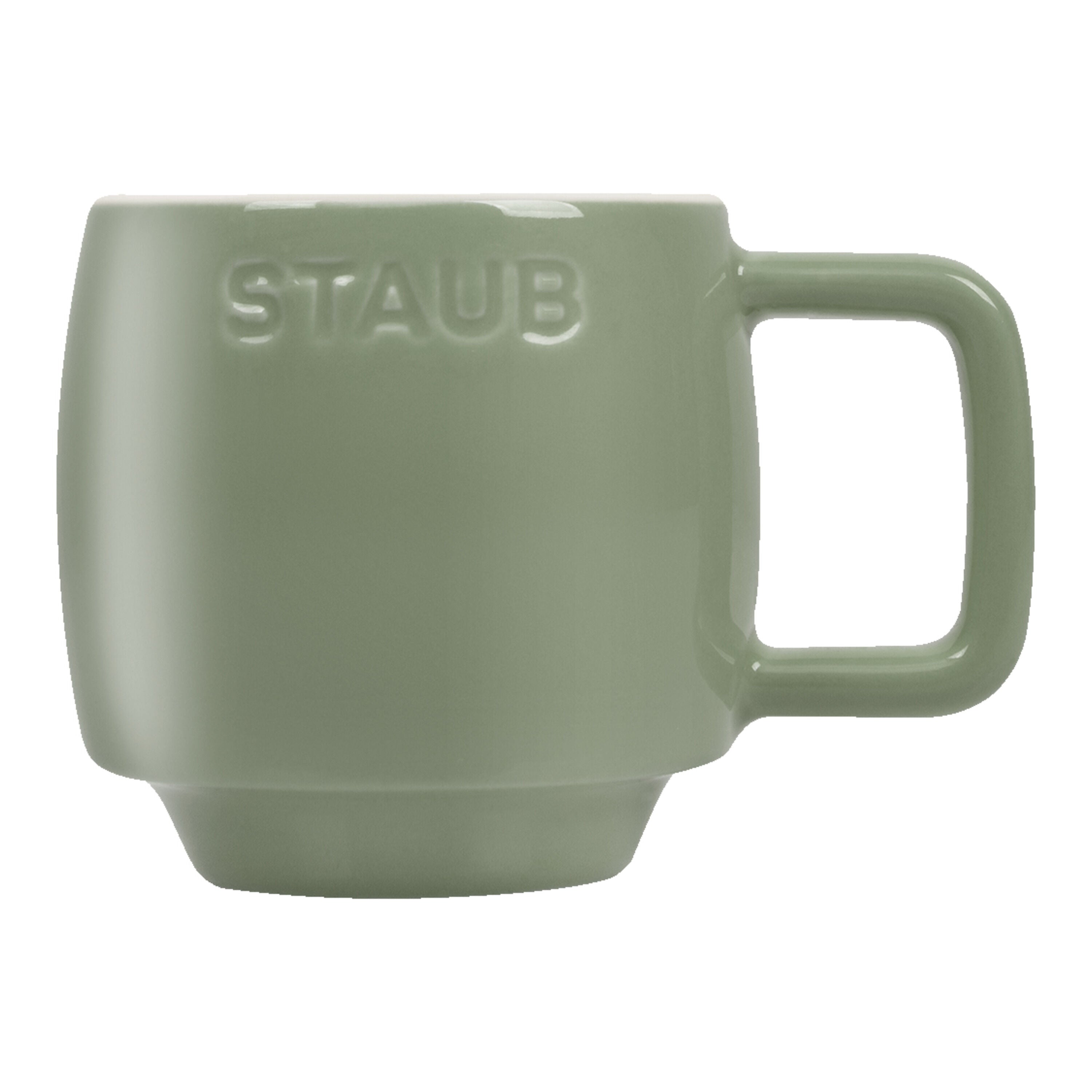 Green mug with 'STAUB' branding on a white background