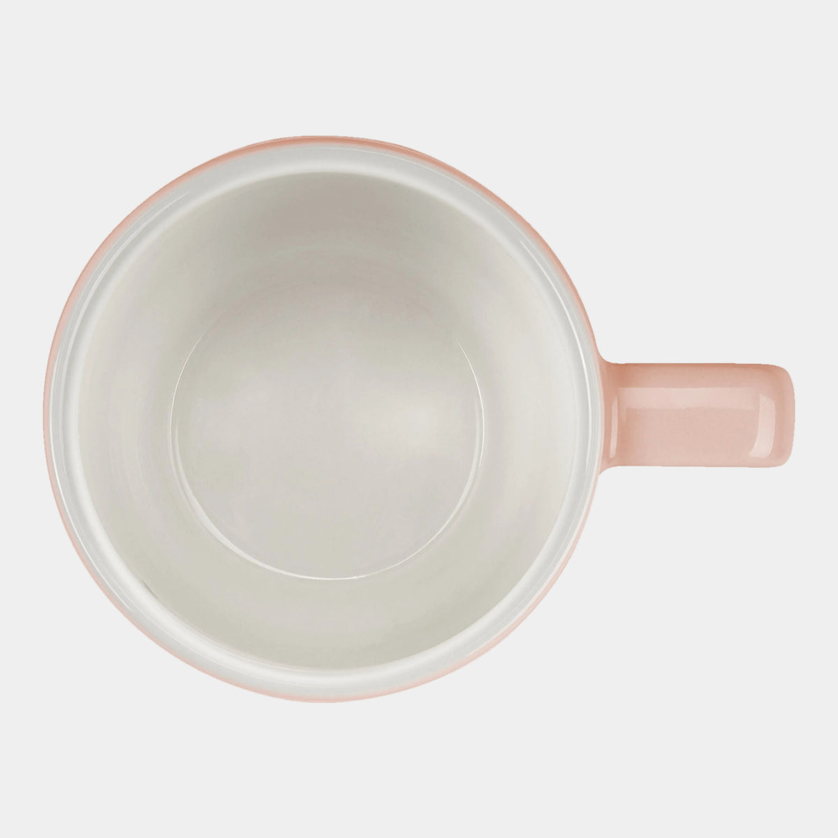 Pink mug on a white background
