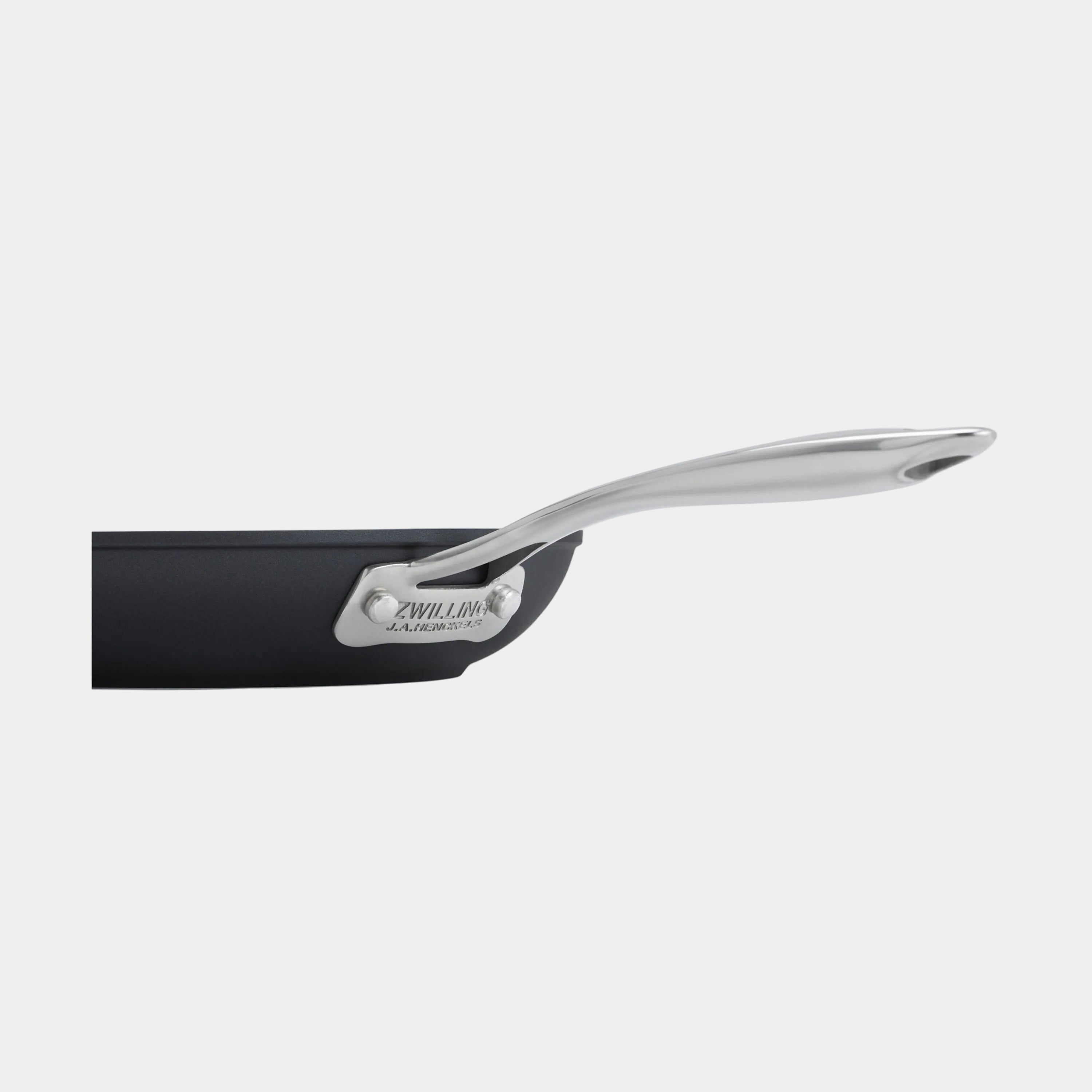 Black cylindrical object with a metallic tip on a white background