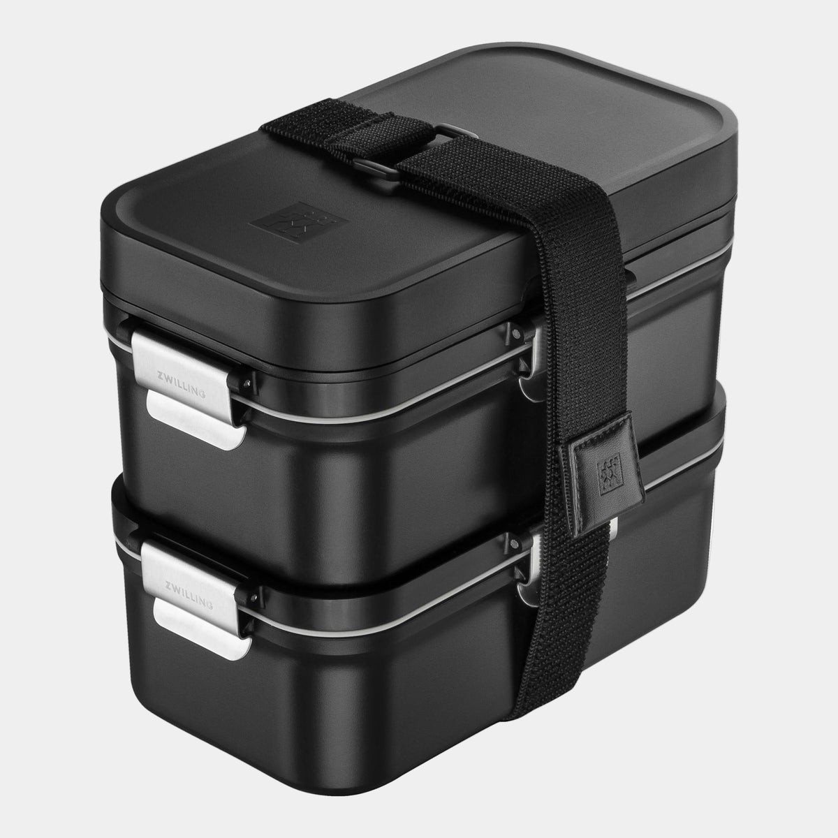 Black stacked lunch box with straps on a white background