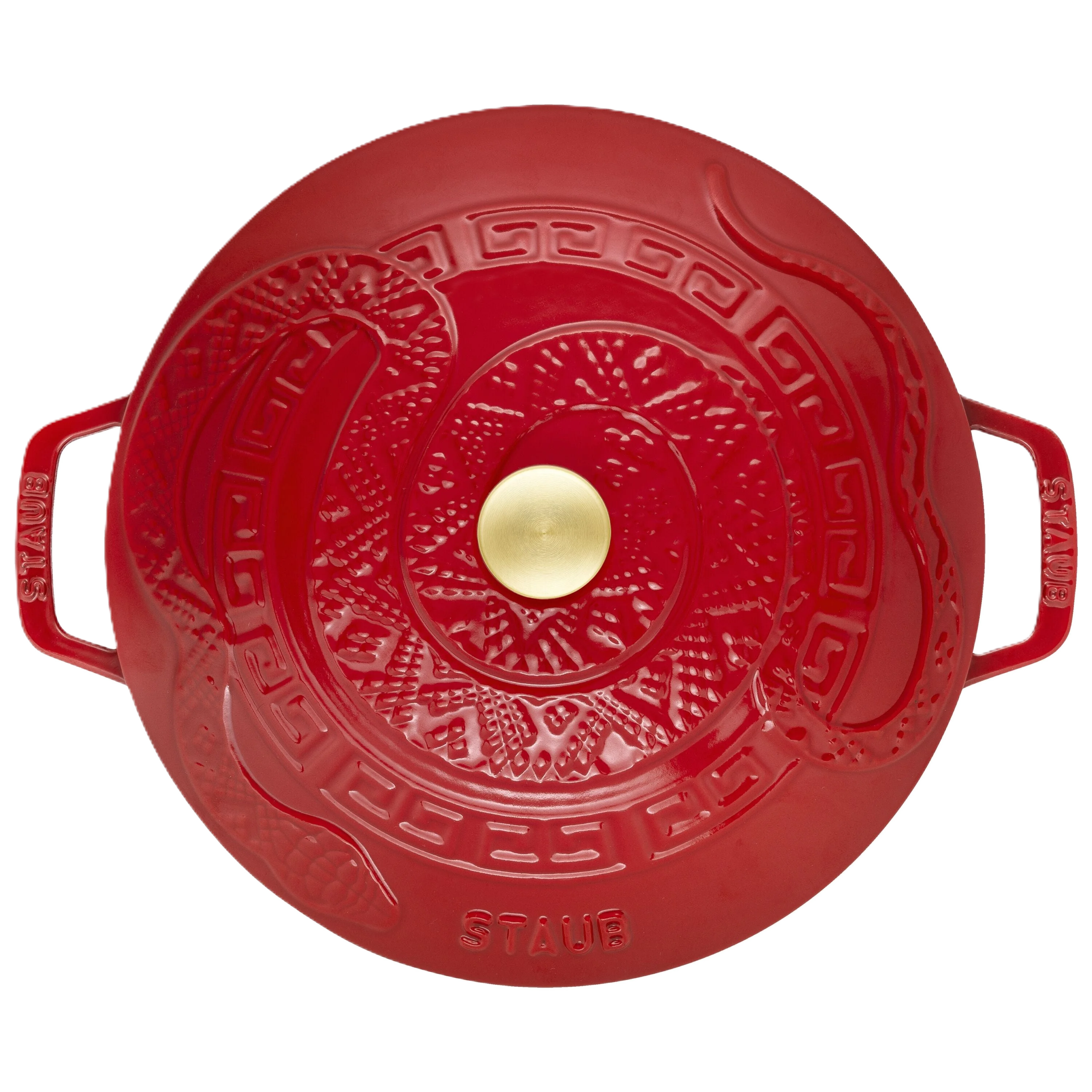 Red Staub cookware lid with gold central knob on a white background