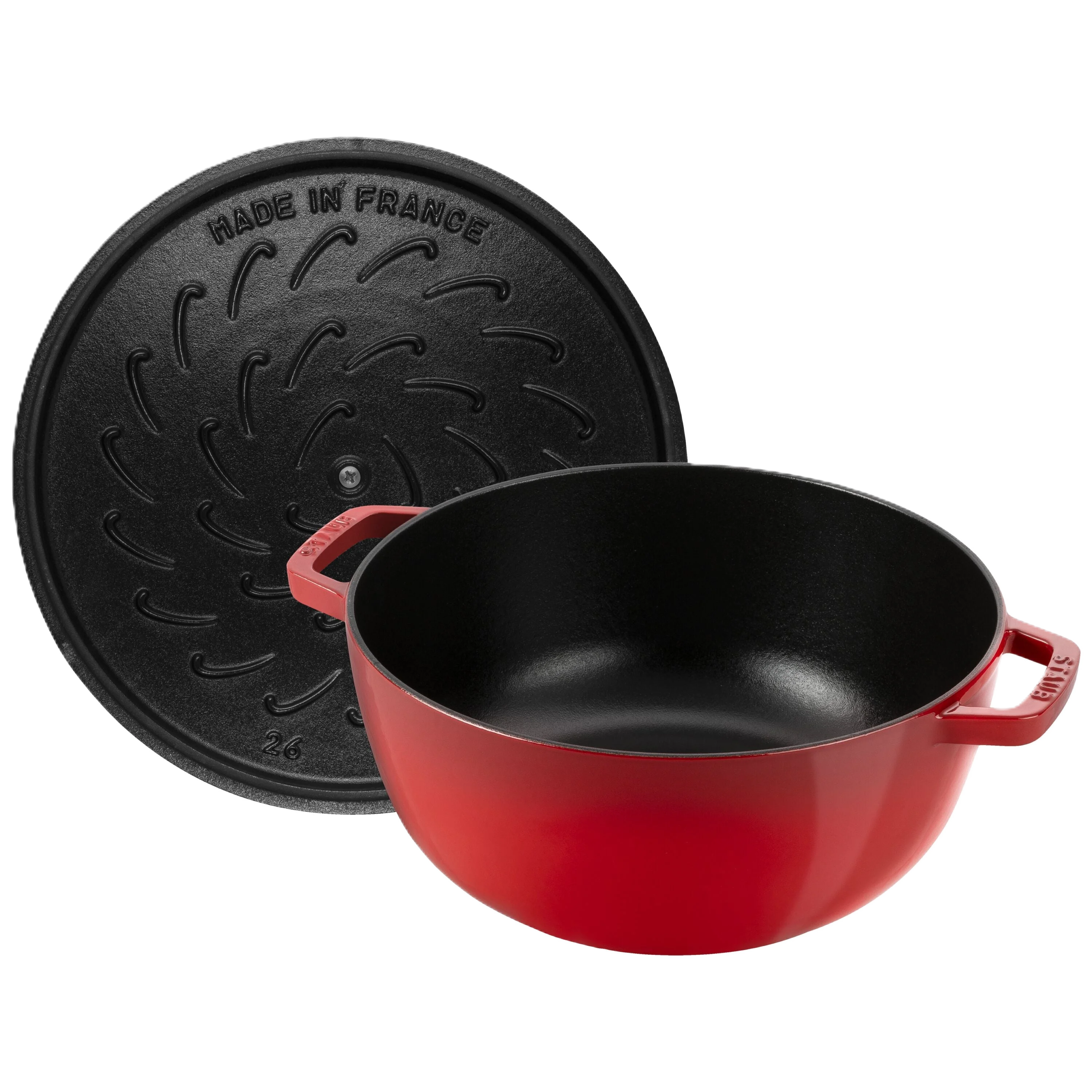 Red cast iron pot with black lid on a white background