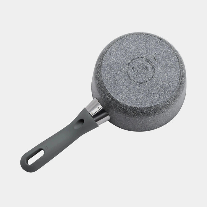 Gray frying pan with a textured surface on a white background