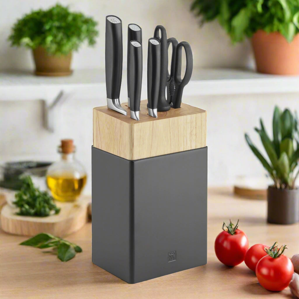 ZWILLING All * Star 7 Piece Knife Block Set, Silver displayed on a kitchen counter with fresh ingredients.