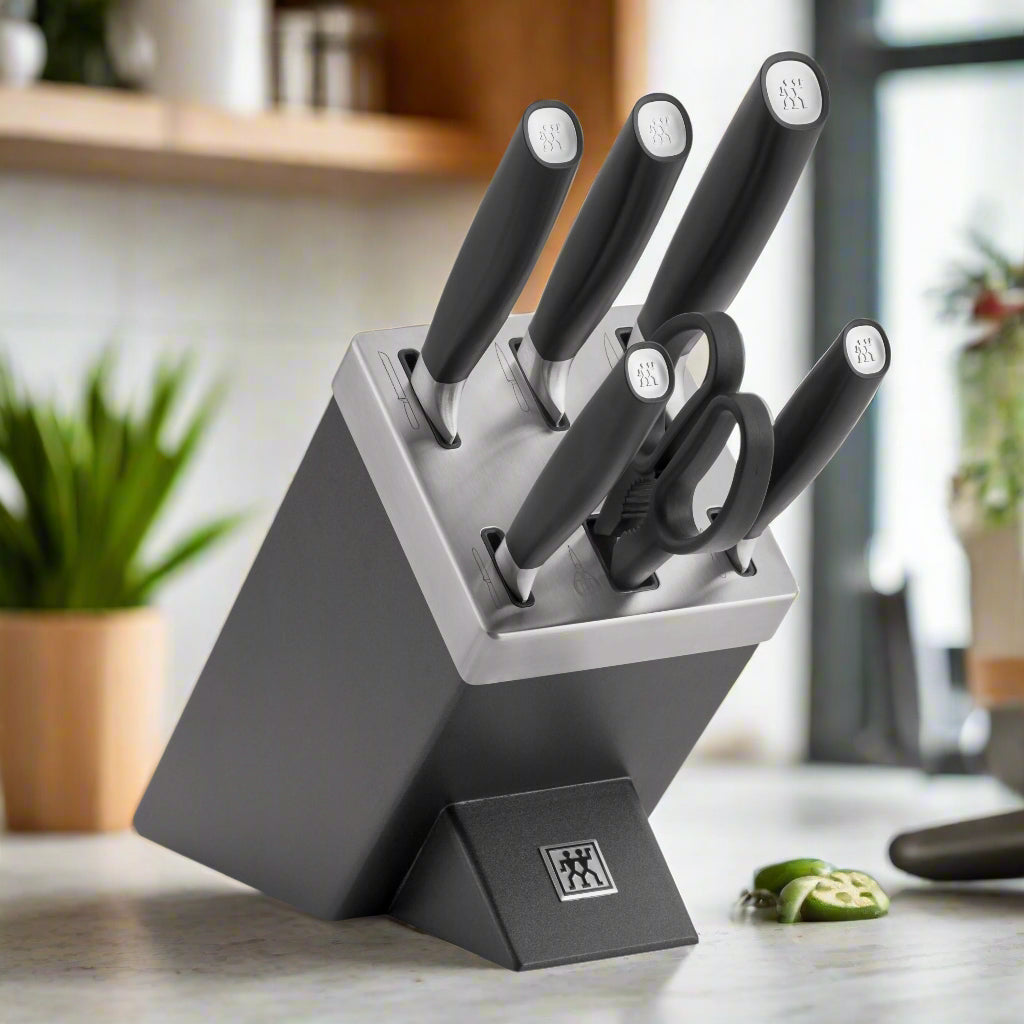 ZWILLING All * Star 7 Piece Knife Block Set, Silver displayed on a kitchen countertop.
