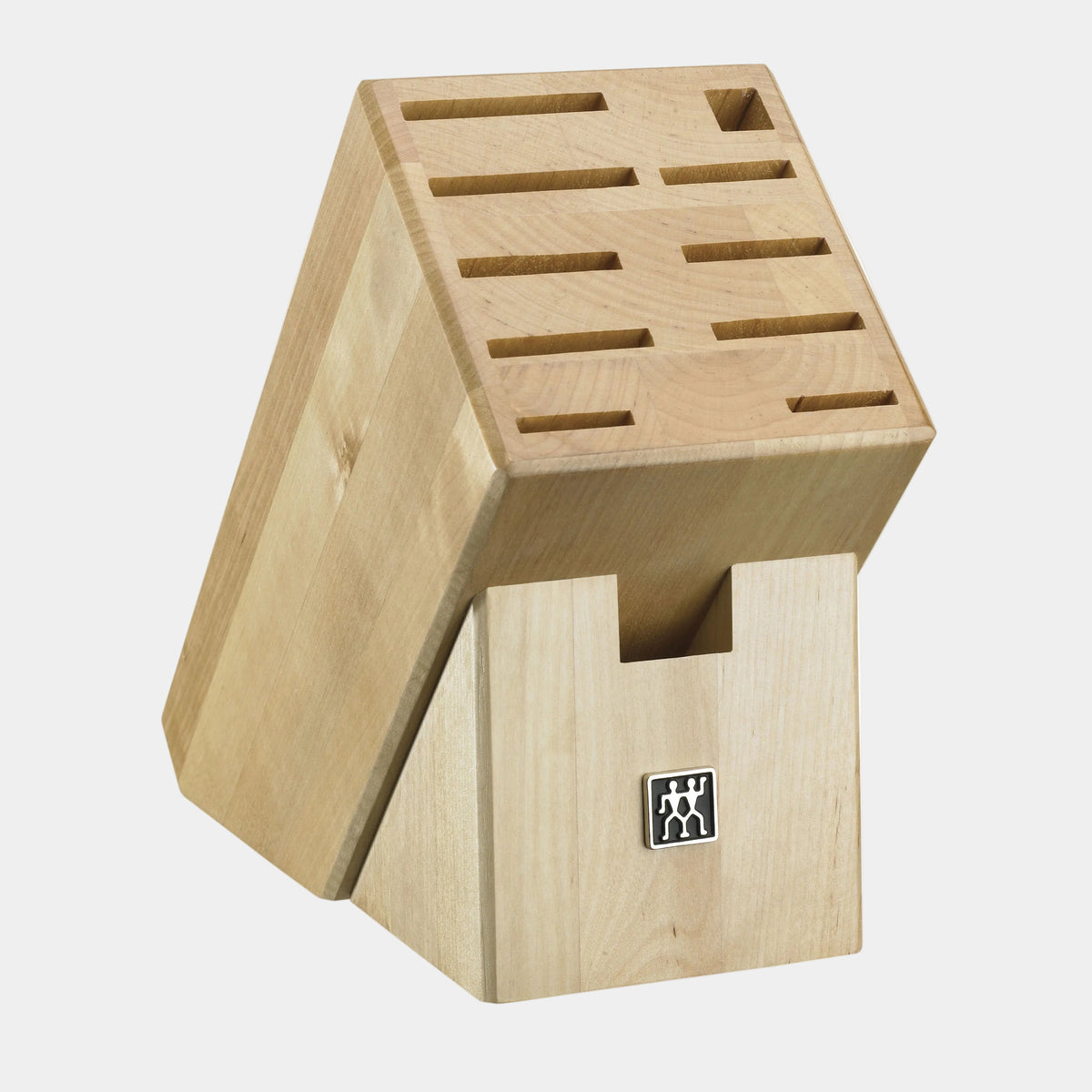 Wooden knife block with multiple slots on a white background