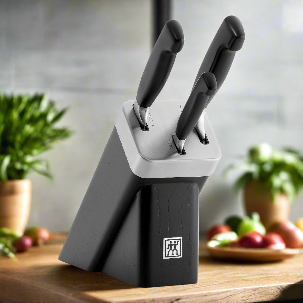 ZWILLING **** Four Star 4 Piece Self Sharpening Block Set, Black in a modern kitchen setting.