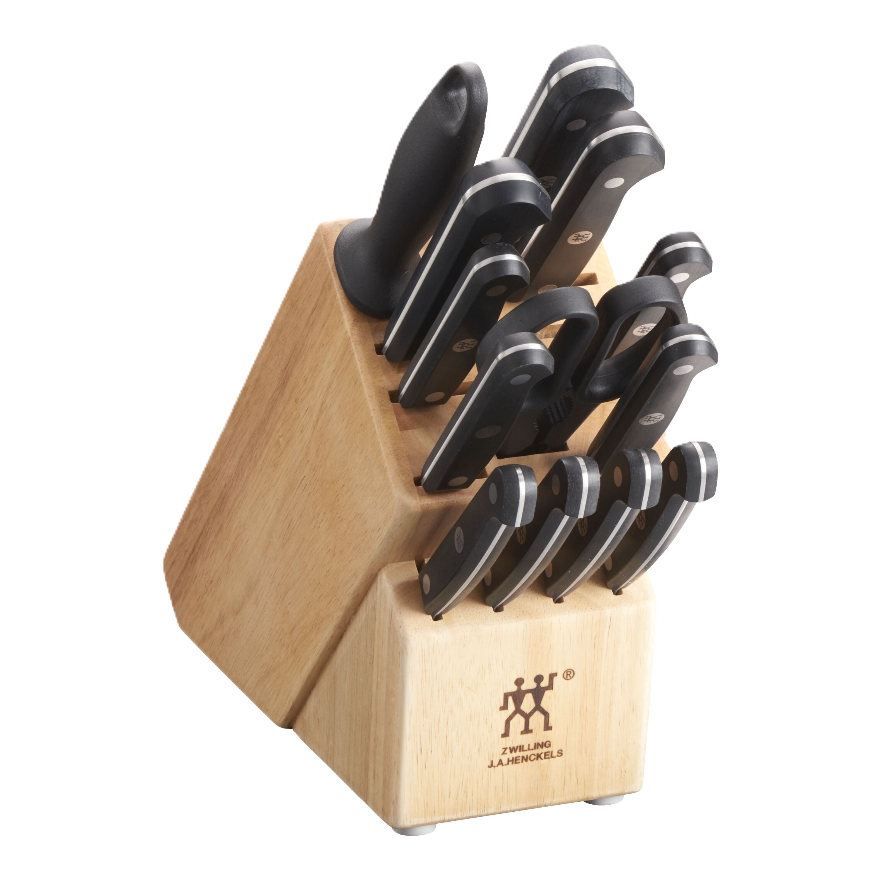 Set of knives in a wooden block on a white background
