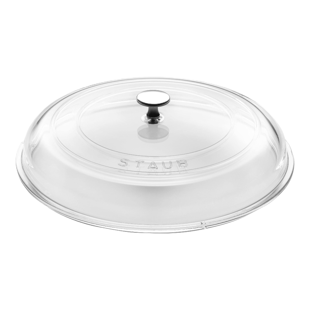 Clear glass lid with silver handle on a white background, featuring the Staub logo.