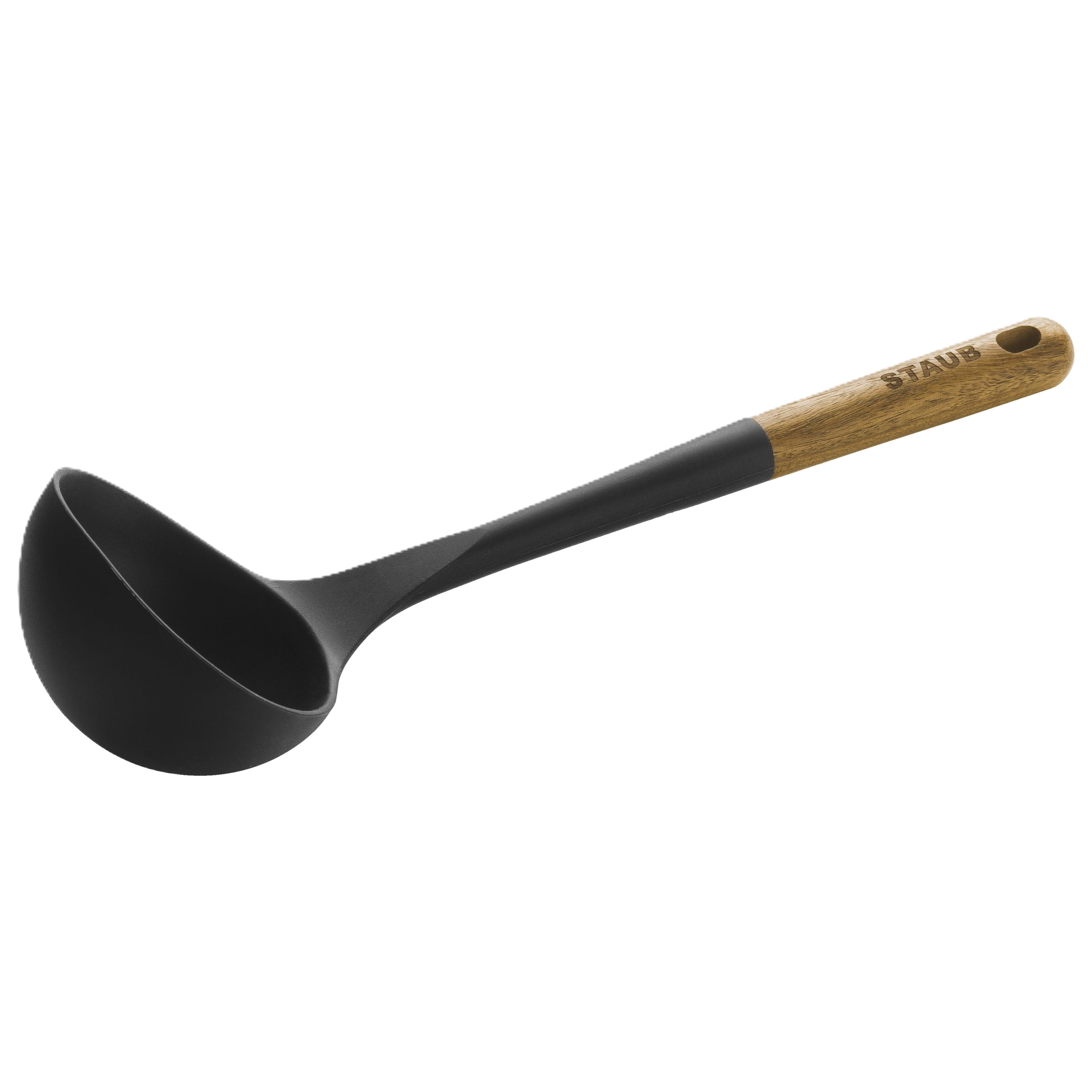 Black ladle with wooden handle on a white background