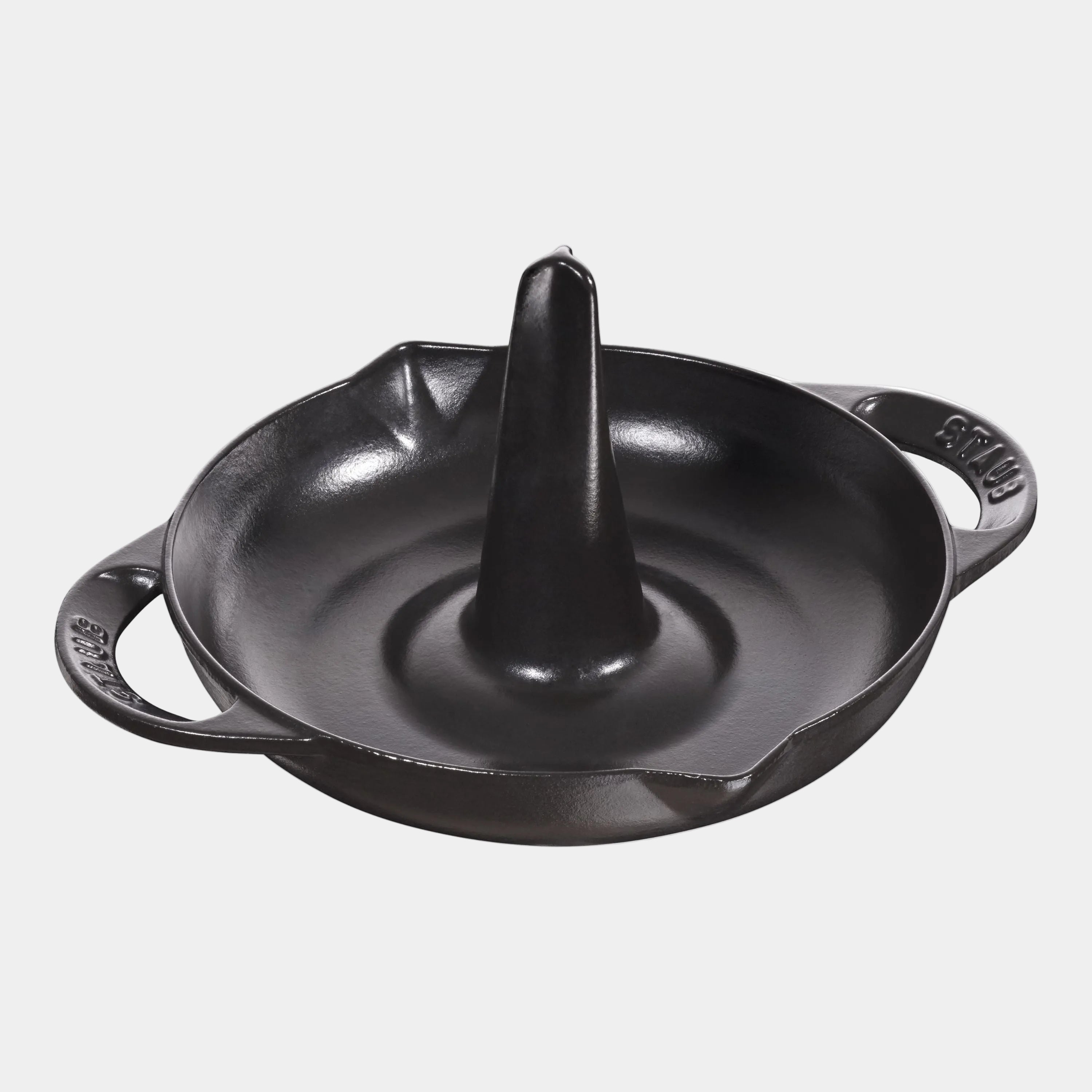 STAUB Specialities Cast Iron Round Roaster, 24 cm in black, featuring a heat-conducting spike for even cooking and crispy results.