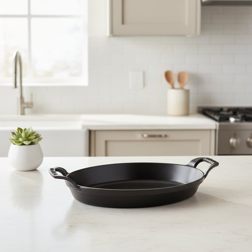 Black cast iron skillet on a kitchen counter with a neutral color scheme