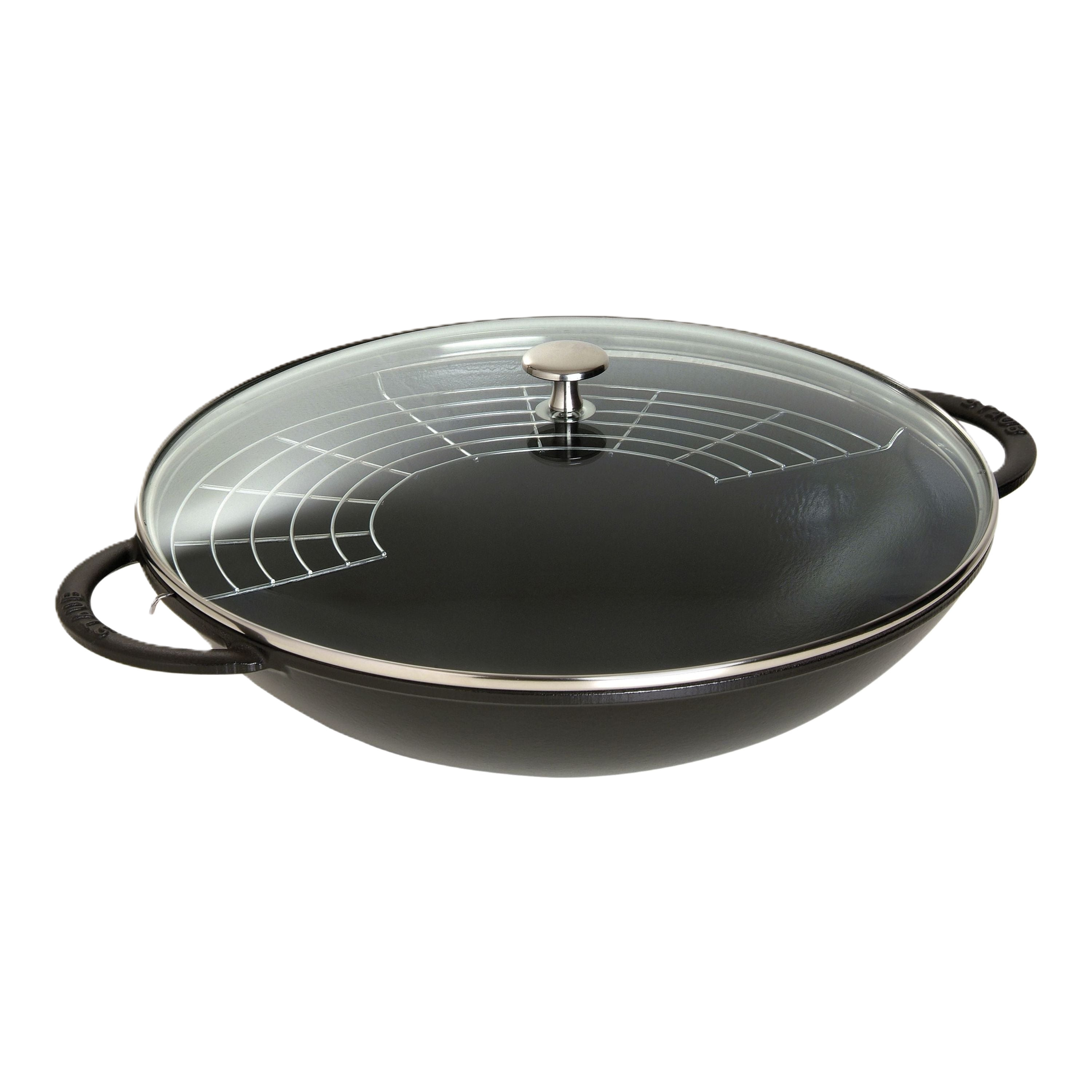 Black wok with glass lid on a white background