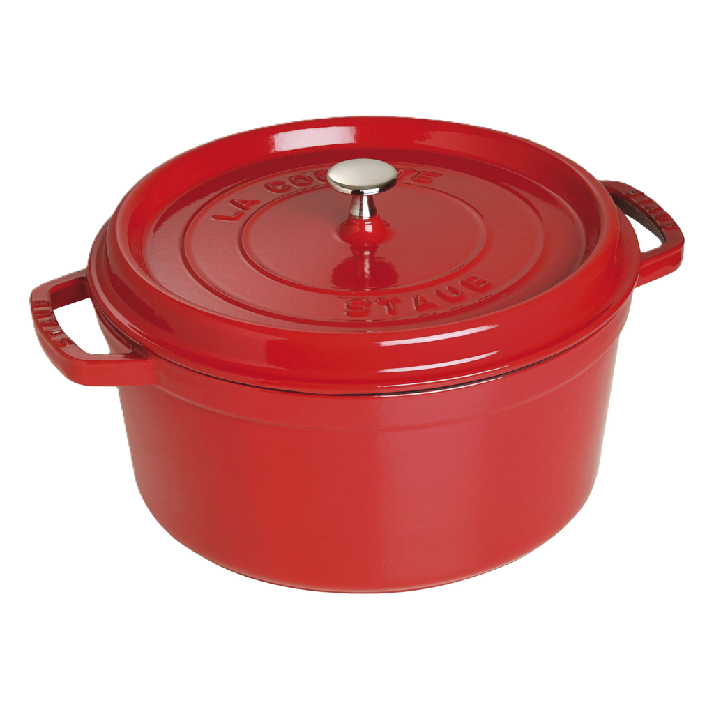 Red Staub cocotte with a silver knob on a white background