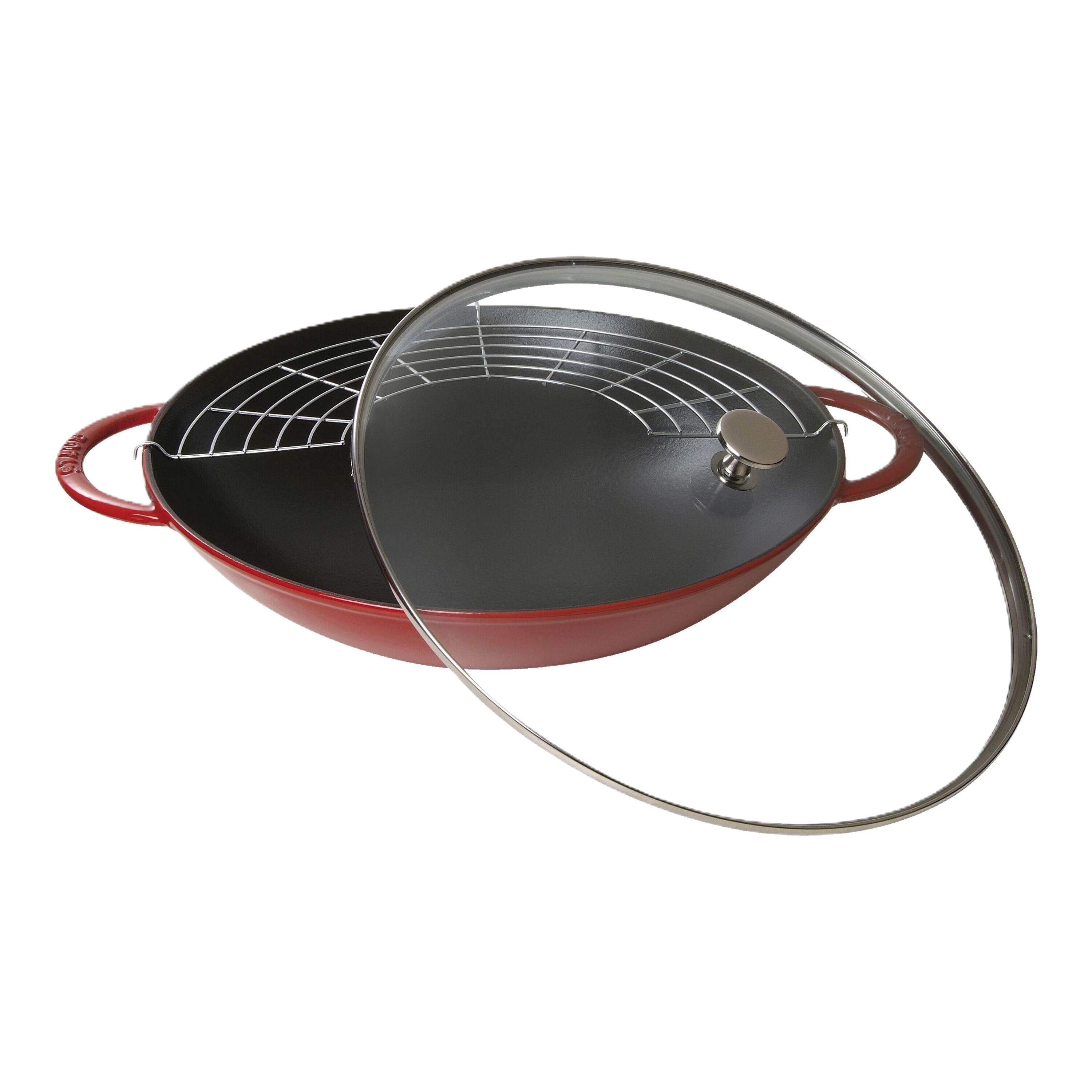 Red frying pan with a glass lid on a white background