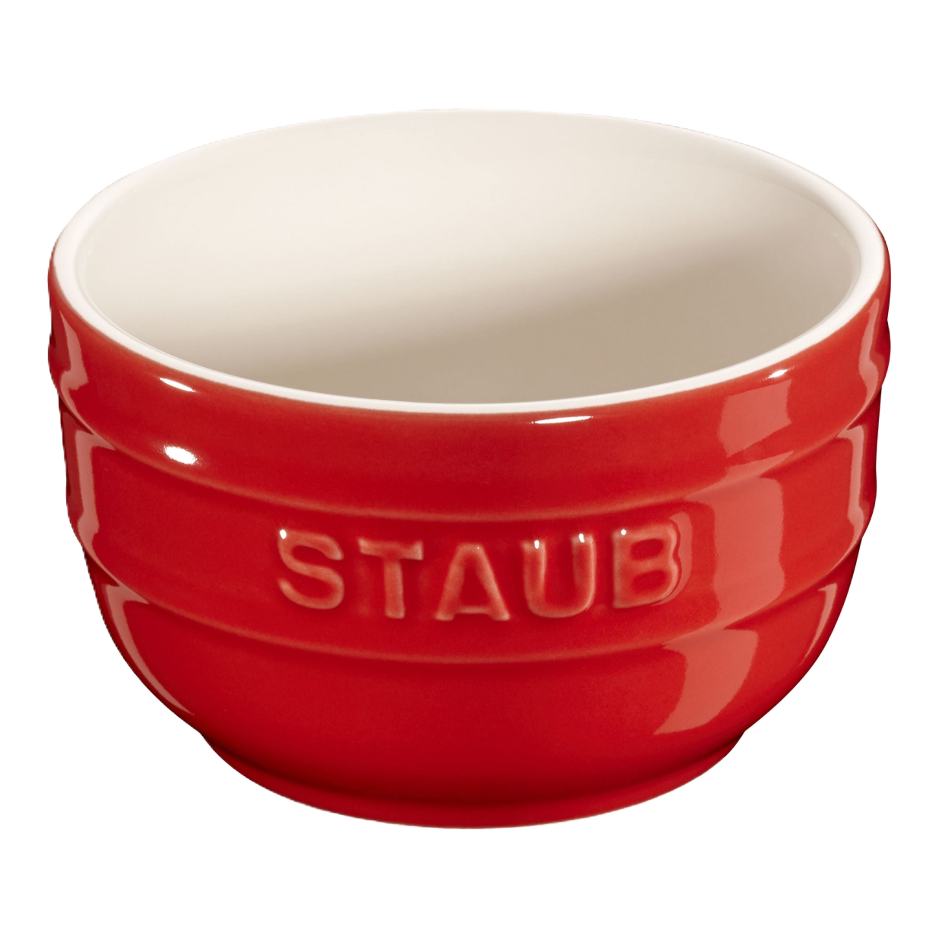 Red Staub bowl on a white background