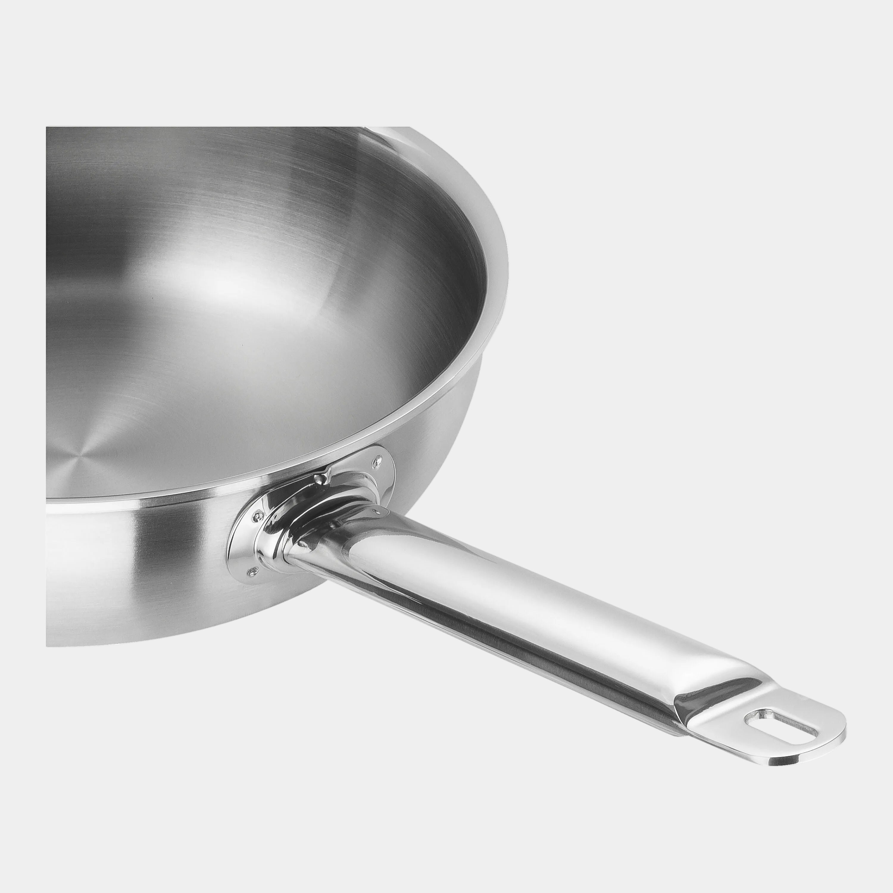 Stainless steel frying pan on a white background