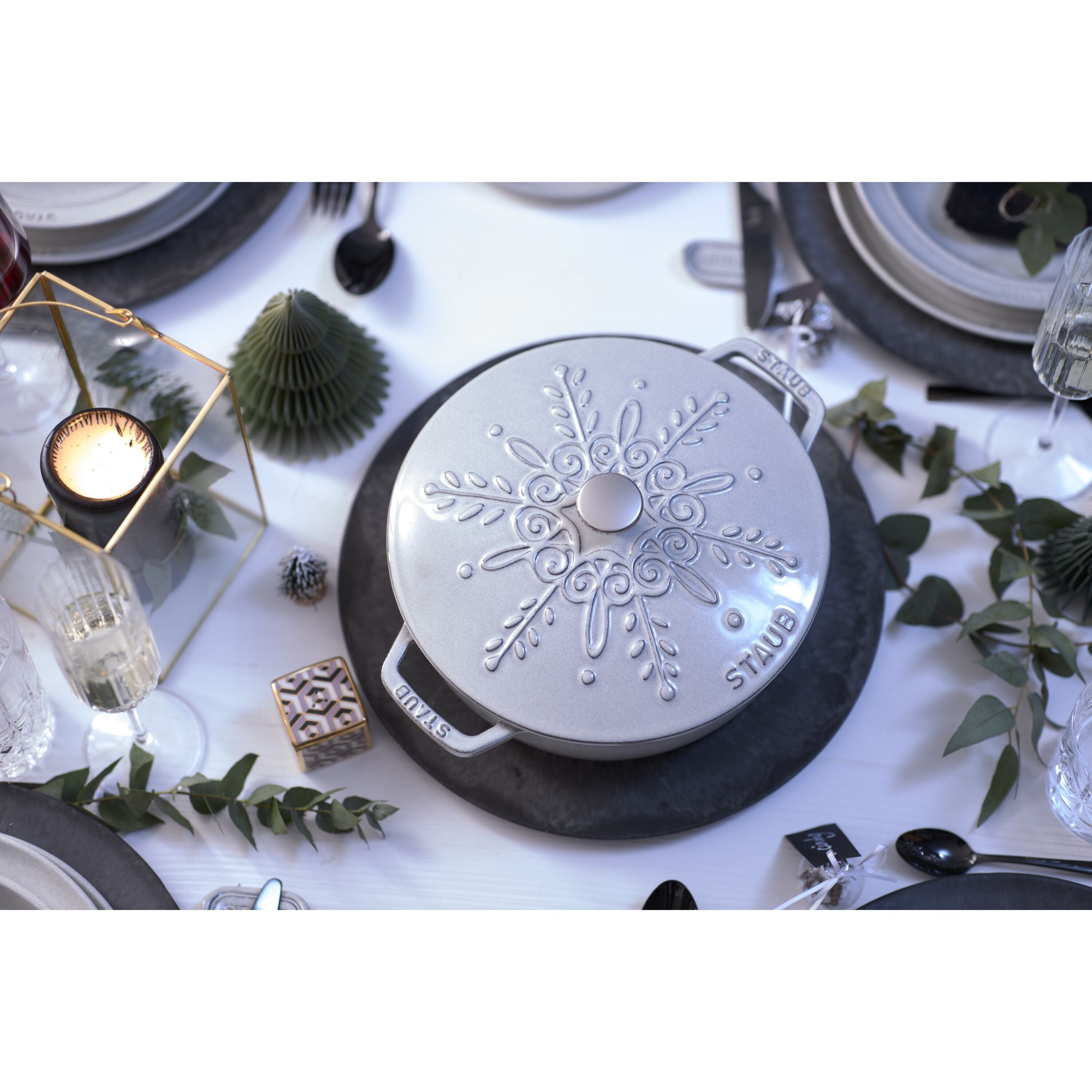 Stylish STAUB La Cocotte 3.6L Round French Oven in Snowflake White Truffle on a festive dining table.