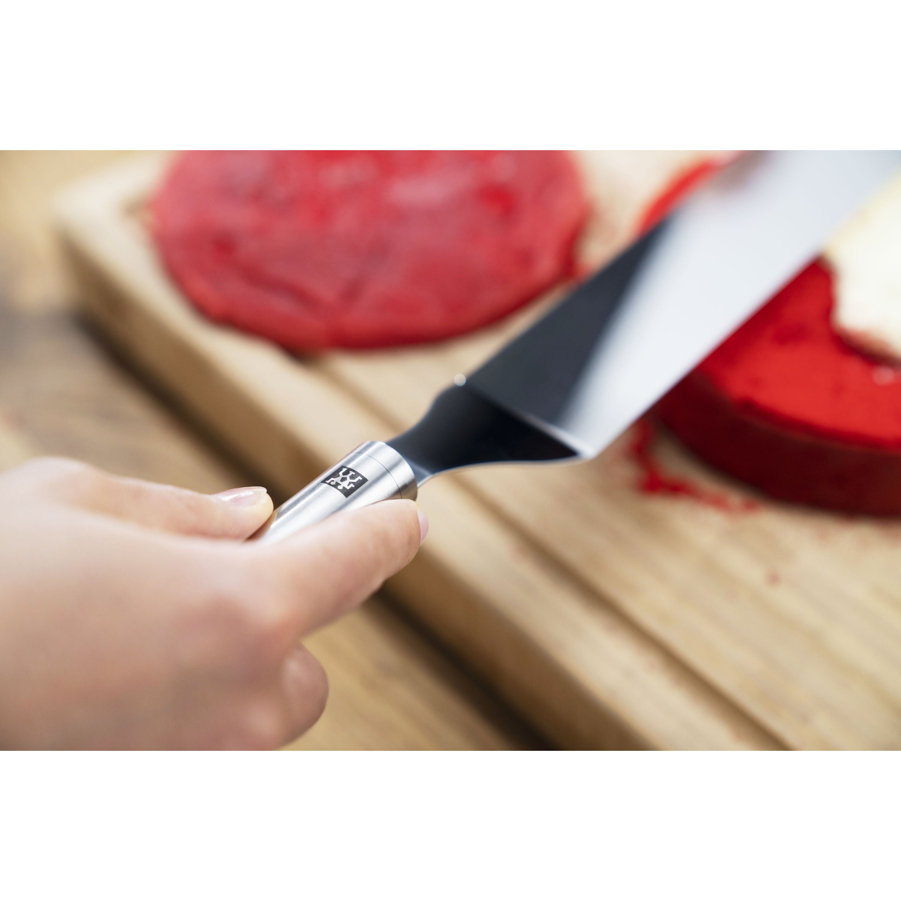 ZWILLING Pro Icing Spatula angled spreading icing on cake