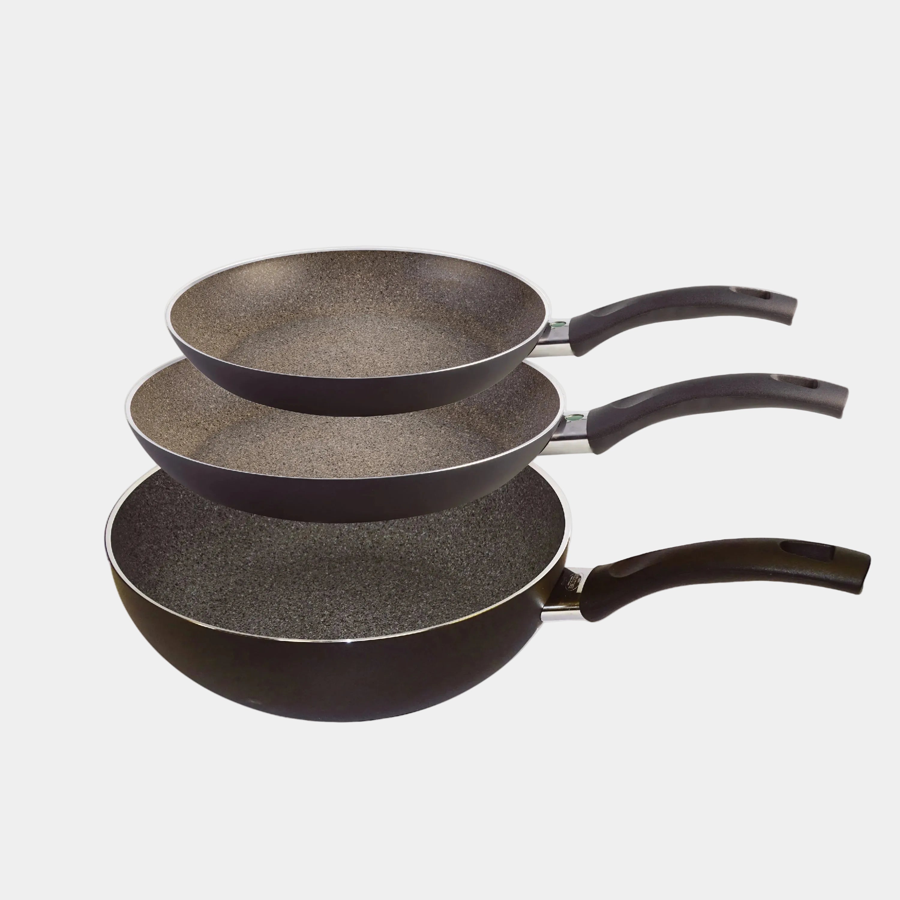 Set of three frying pans with black handles on a white background