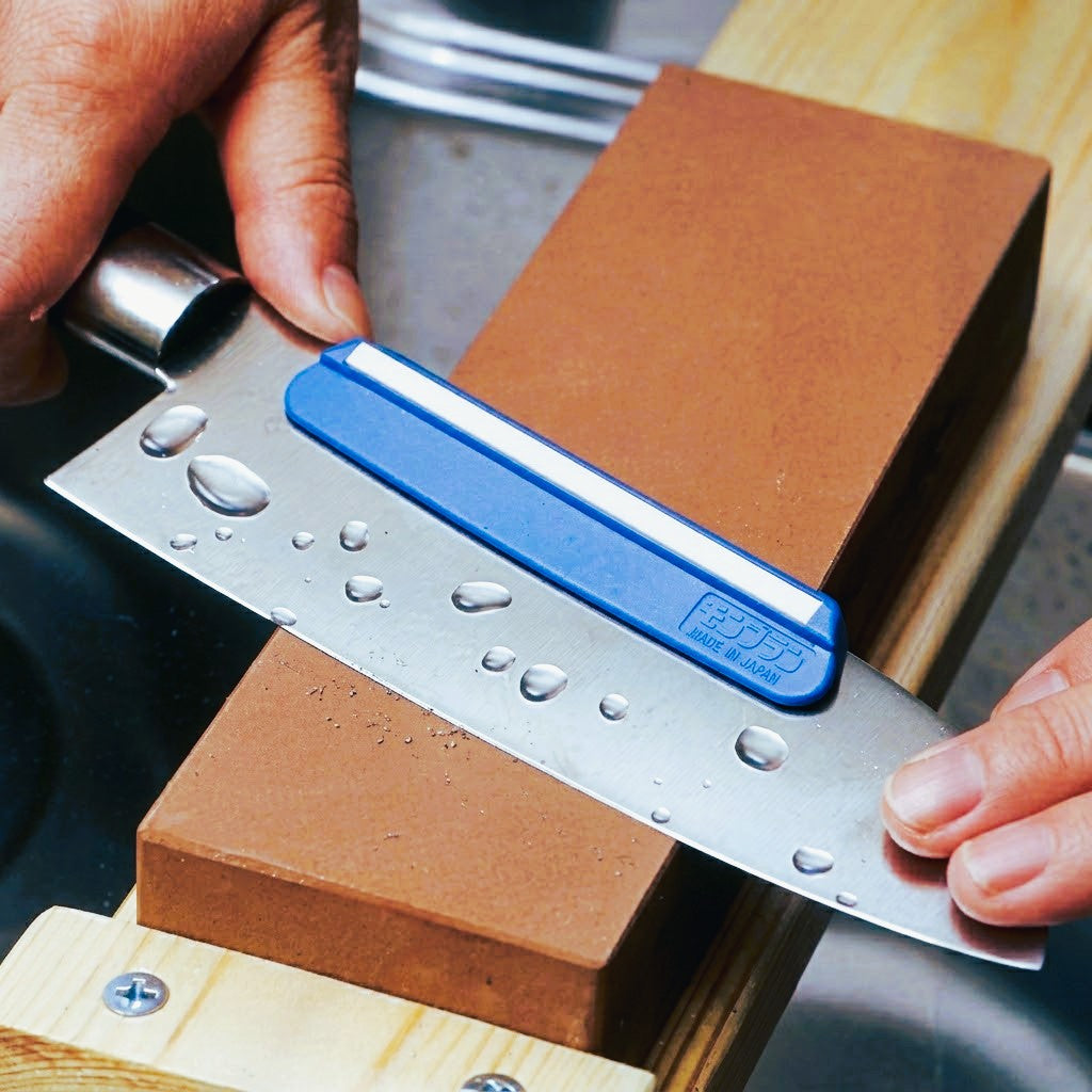 Shimizu Super Togeru Ceramic Knife Sharpening Angle Guide Clip. knife sharpening in action lifestyle