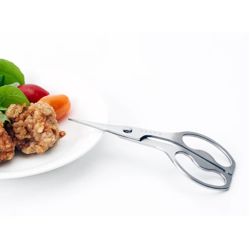 EAtoCO Cutlery Hasami Table Scissors cutting food on a plate with ergonomic handles, Yoshikawa Made in Japan